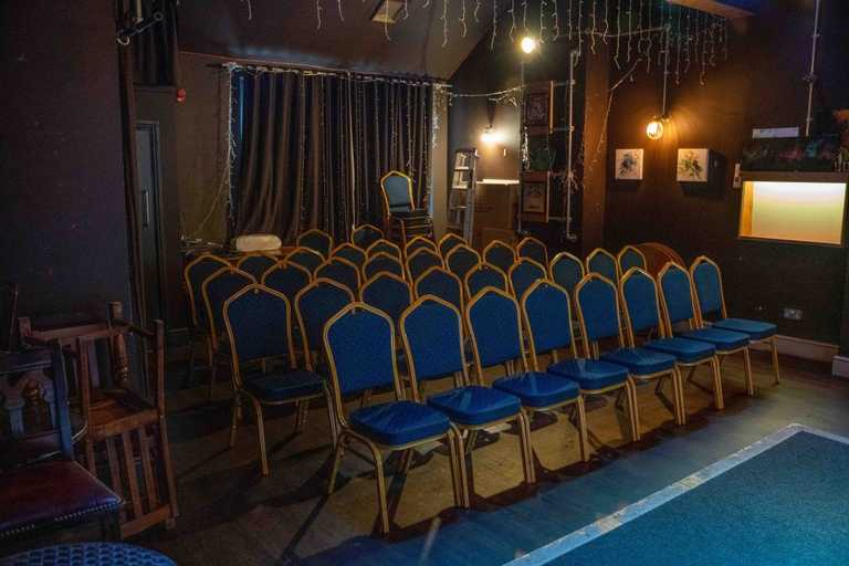 chairs line up in theatre style in function room